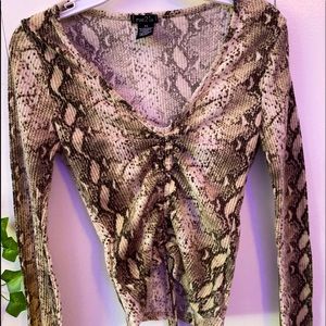 woman's long sleeve lace up top